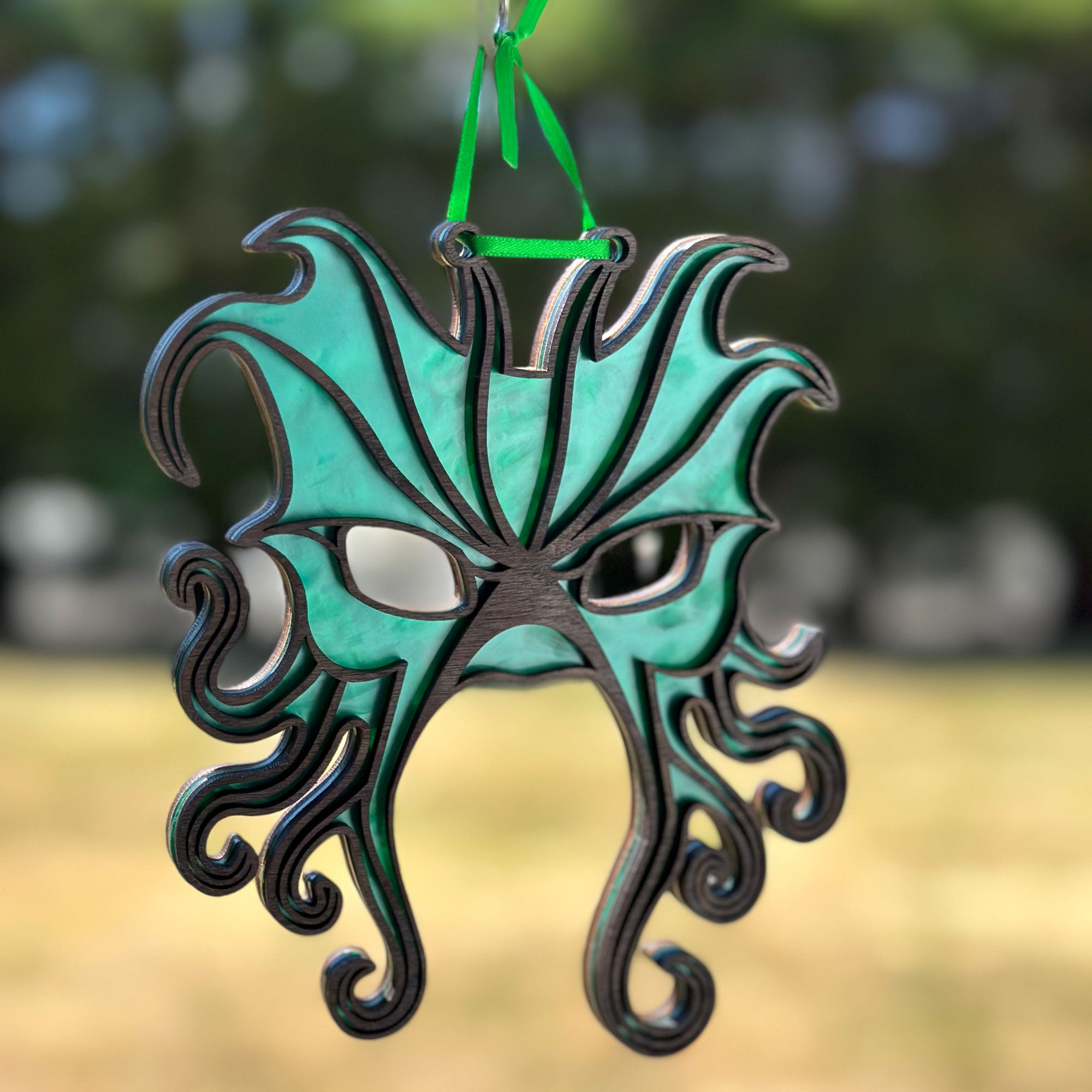 Green Man Cthulhu mask suncatcher
